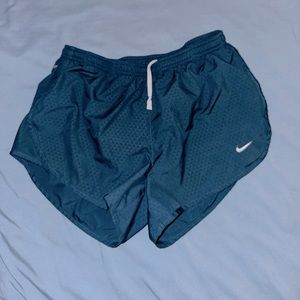 Blue Nike dry fit running shorts. Size Medium.